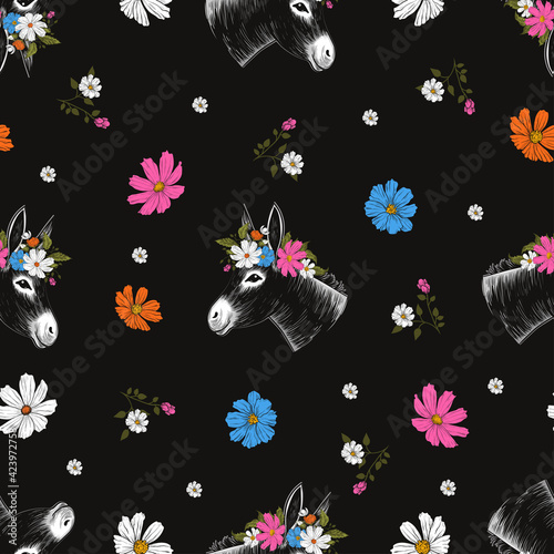 .Cute donkey in a wreath and various flowers on a black background. Vector seamless pattern. Hand drawn realistic animal portrait . Vintage design..