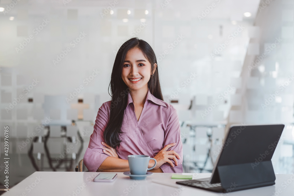 Portrait of confident smiling asian business woman in casual wear at meeting room. Portrait of confident smiling asian business woman in casual wear at meeting room.