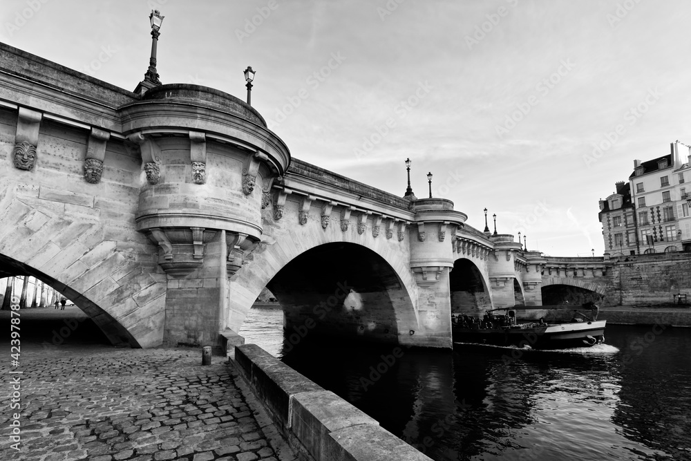 Barge under the pont Neuf bridge in Paris 6th arrondissement