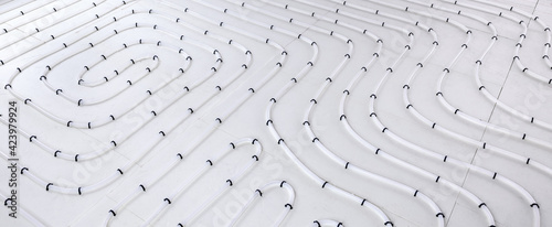 underfloor heating system pipes on insulation. radiant floor heating