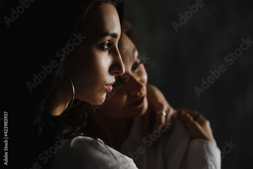 love and tender warm feelings, two adult women, mother and daughter embrace