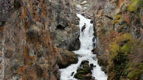 Altai mountains in autumn. Beltertuyuk waterfall on Katun river. photo