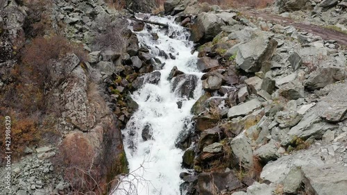 Altai mountains in autumn. Beltertuyuk waterfall on Katun river. photo