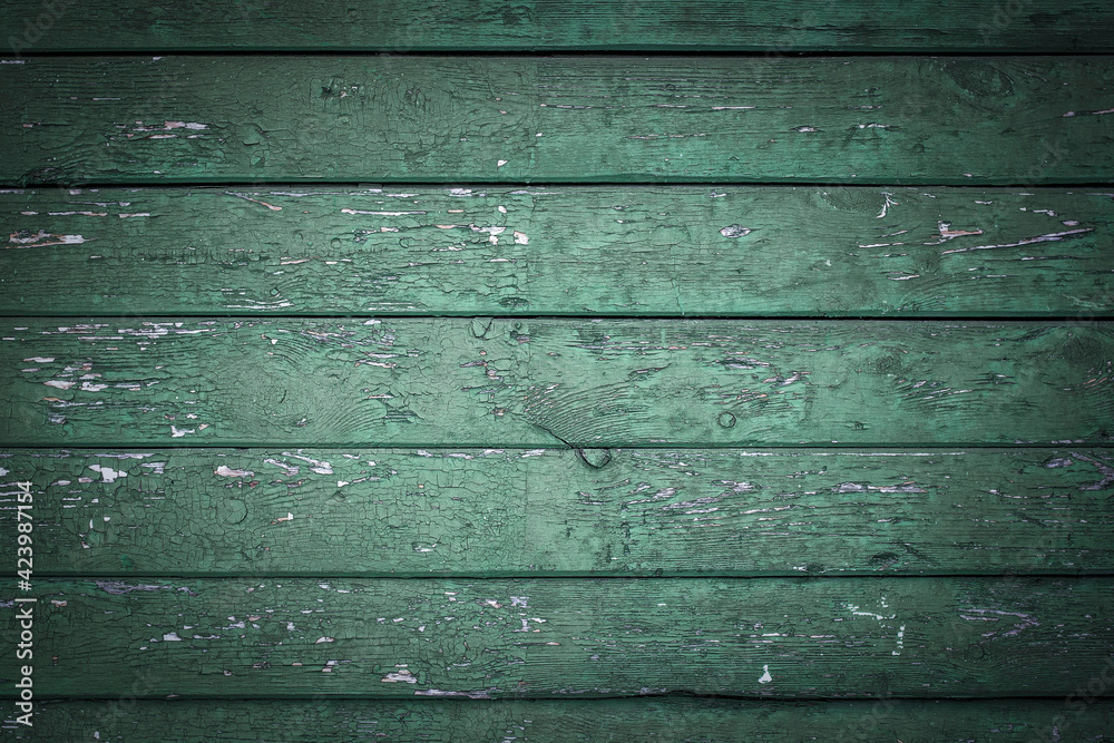 Natural Wooden Background. Old painted in green boards Natural Wooden Background. Old painted in green boards