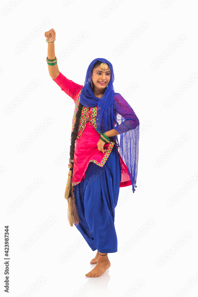 A Giddha dancer performing a Dance step	
