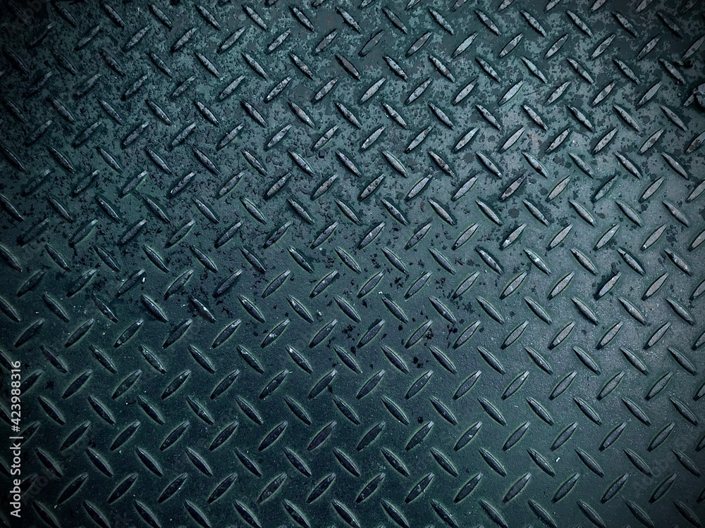 Black checkered plate background and texture. Black checkered plate background and texture.