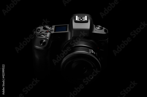 dslr photo camera body silhouette on black background photo