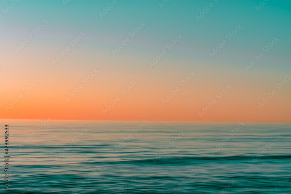 A tranquil sunrise over the Atlantic Ocean.