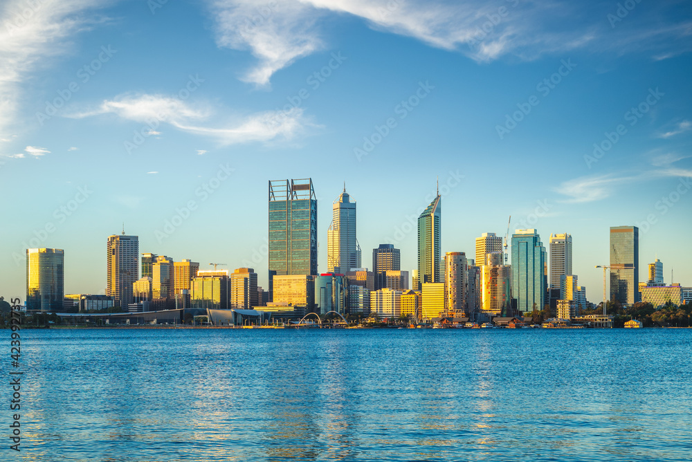 skyline of perth at dusk by swan river in western  australia