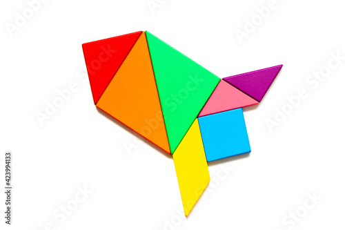 Color tangram puzzle in shape rocket or missile on white background