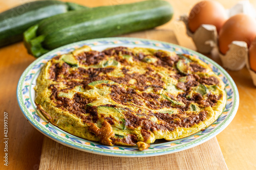Omelette with zucchini. Homemade omelette, typical mediterranean dish