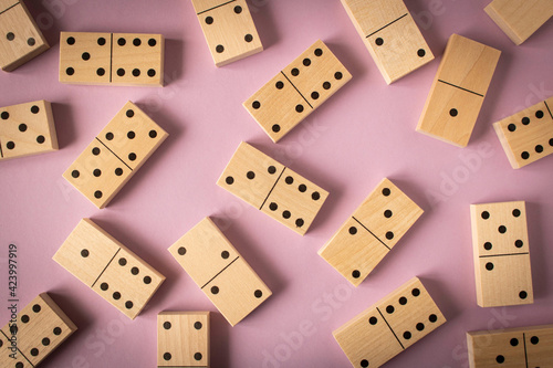A game of dominoes on a light background. Close-up. Selective focus.