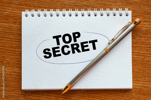 Wallpaper Mural text TOP SECRET in notepad. office furniture on the table. business and finance Torontodigital.ca