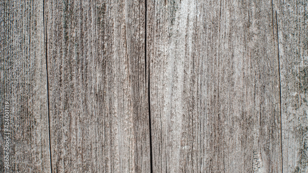 Old brown wood background made of light natural wood in grunge style. The view from the top. Natural raw planed texture of coniferous pine. The surface of the table to shoot flat lay. Copy space. Old brown wood background made of light natural wood in grunge style. The view from the top. Natural raw planed texture of coniferous pine. The surface of the table to shoot flat lay. Copy space.