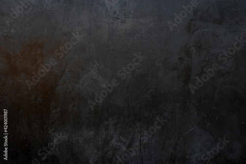 Grunge dark black background or texture with space © Ratchapon