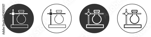 Black Glass test tube flask on stand icon isolated on white background. Laboratory equipment. Circle button. Vector