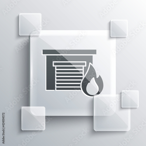 Grey Fire in burning garage icon isolated on grey background. Square glass panels. Vector