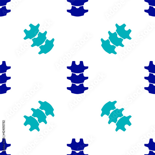 Blue Human spine icon isolated seamless pattern on white background. Vector