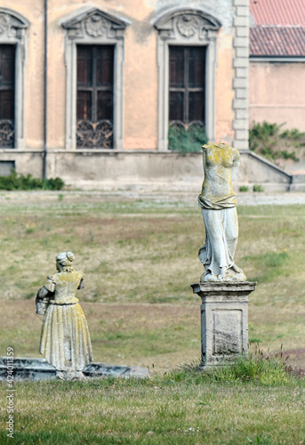 old statue in old statue looking at you - in Old Villa Bagatti Valsecchi - Varedo, Monza Brianza, Lombardy Italy photo