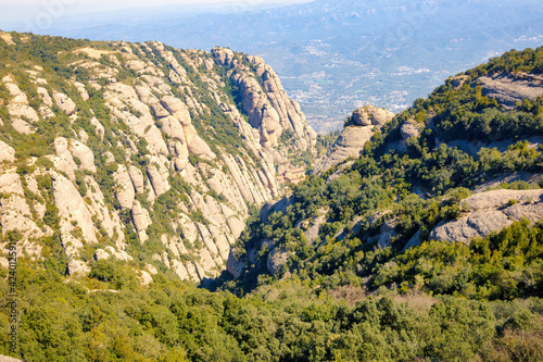 View of the valley where the Montserrat Monastery tourist-religious complex is located from the Saint Joan funicular. Montserrat massif natural park, Catalonia, Spain