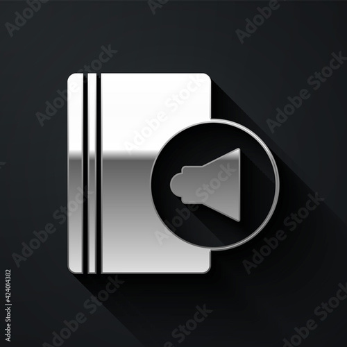 Silver Audio book icon isolated on black background. Book with headphones. Audio guide sign. Online learning concept. Long shadow style. Vector