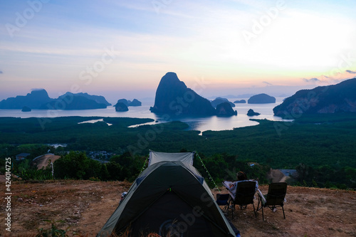 Someone camping at viewpoint. Beautiful mountains and mangroves forest with the bay in the morning at Phang Nga, Thailand