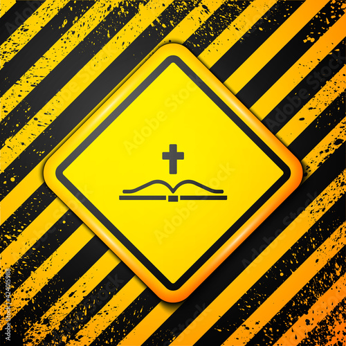 Black Holy bible book icon isolated on yellow background. Warning sign. Vector