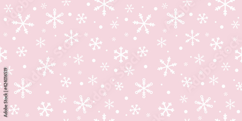 Pink and white snowflakes vector pattern background