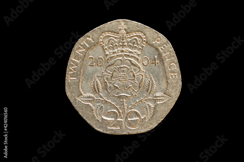 Reverse of the Great Britain twenty pence coin of 2004, isolated on a black background
