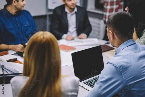 Wallpaper Mural Group of professional managers communicate about financial advertising text for web publication on laptop computer with copy space area, male and female partners discussing business strategy Torontodigital.ca