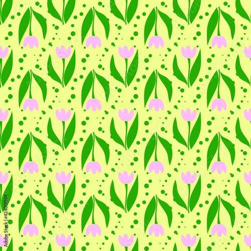 Vector seamless pattern with multi-colored flowers and green leaves on a yellow background. Use in fabric, wrapping paper, wallpaper, bags, clothes, dishes, cases on smartphones and tablets.
