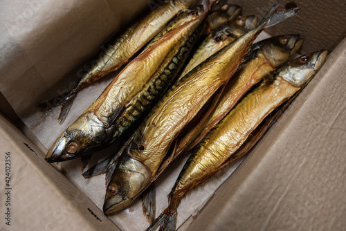 Smoked fish in craft paper ...
