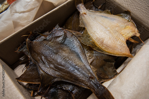 Smoked fish in craft paper ...