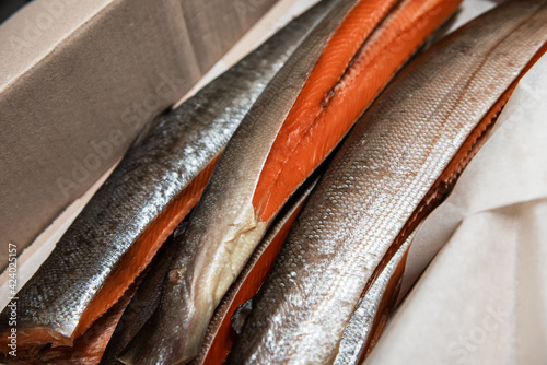 Smoked fish in craft paper ...