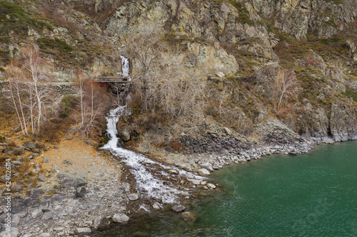 Altai mountains in autumn. Beltertuyuk waterfall on Katun river. photo