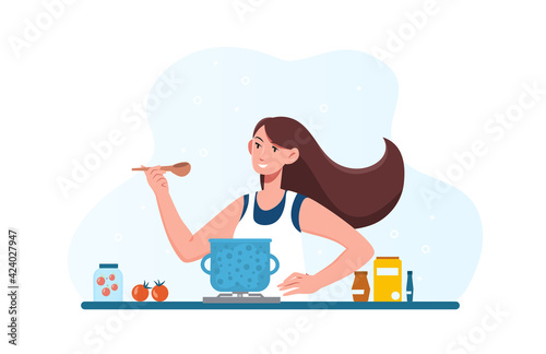 Woman cooking dietary vegetarian soup in kitchen