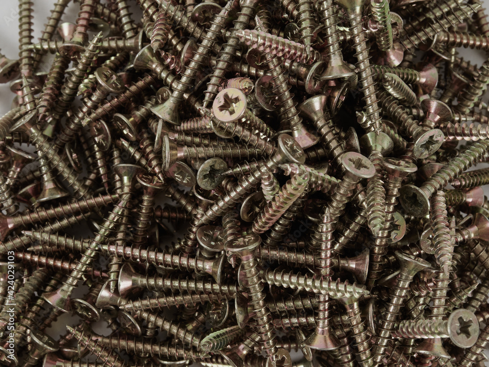 variety of screws and fasteners isolated on white background variety of screws and fasteners isolated on white background