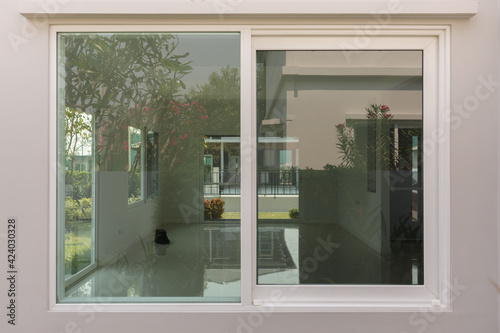 Modern window frame outside the house © Piman Khrutmuang