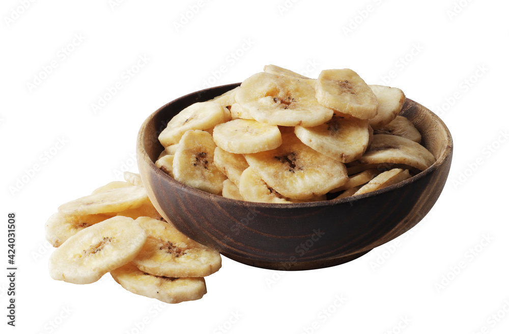 Wooden bowl with sweet banana slices on white background, top view. Dried fruit as healthy snack