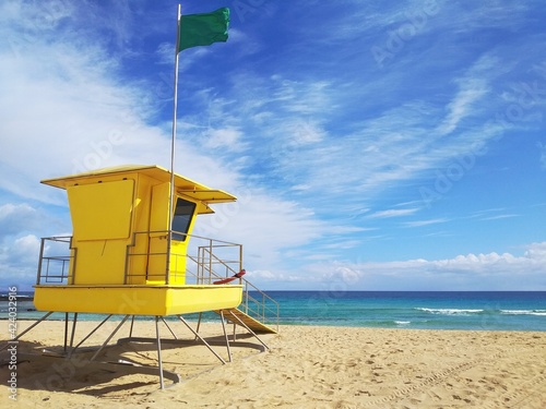 Yellow lifeguard post on the coast of Fuerteventura, Spain.  © kalinaivanova