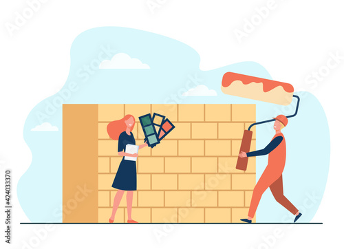 Tiny designer choosing color for wall and showing it painter. Brick, decorator, house flat vector illustration. Renovation and construction concept for banner, website design or landing web page