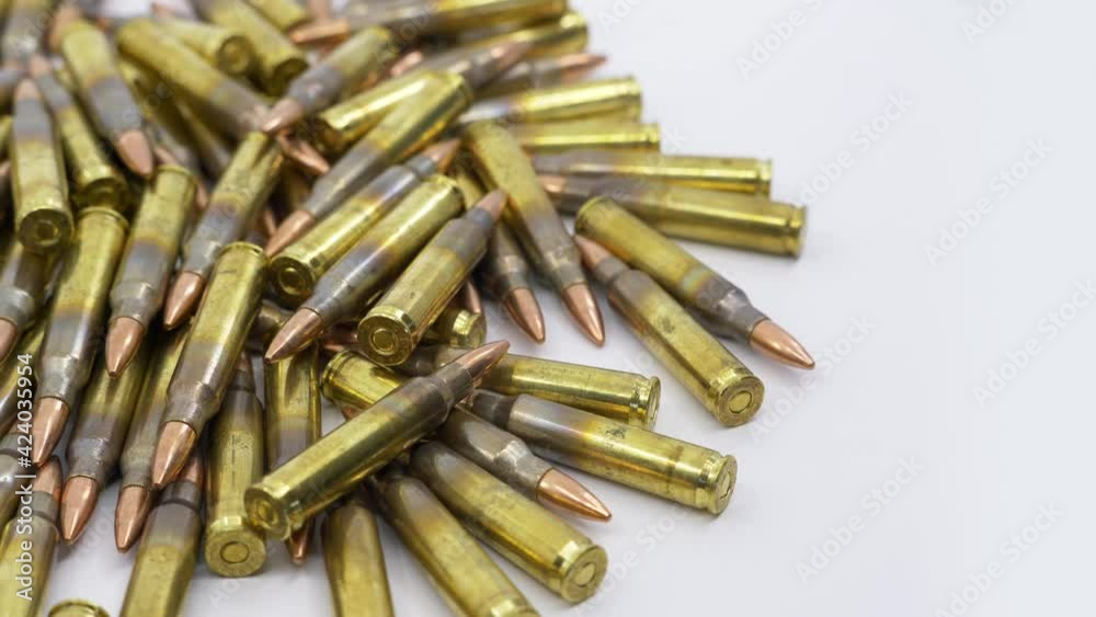 Close Up of Rifle 5.56 Reloaded Ammunition Left Justified Rotating Close Up of Rifle 5.56 Reloaded Ammunition Left Justified Rotating