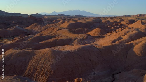 Aerial, rolling desert landscape in Utah