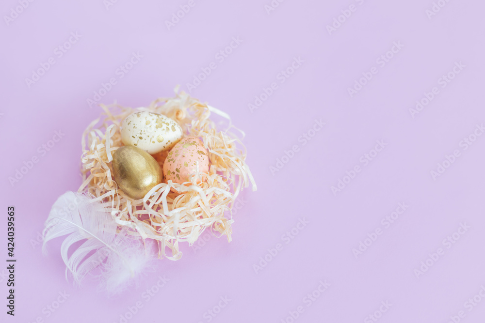 Easter background with eggs in a nest and white feather. Pastel colors. Easter background with eggs in a nest and white feather. Pastel colors.
