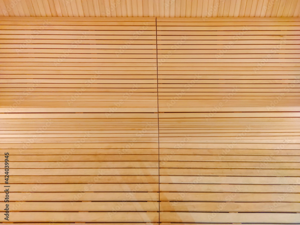 Interior of the wooden sauna - detail of the bench Interior of the wooden sauna - detail of the bench