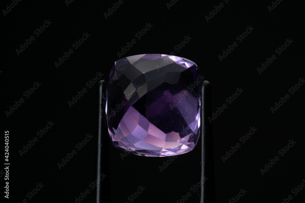 Natural stone amethyst on black background Natural stone amethyst on black background