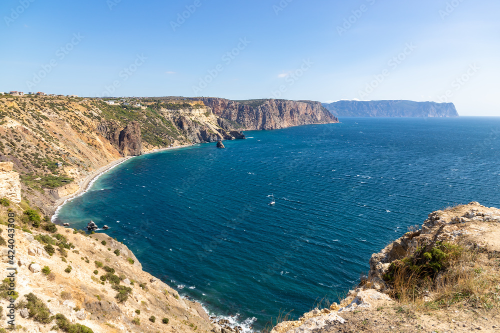 Cape Fiolent in Crimea. Beautiful views of the Black Sea coast at Cape Fiolent in summer. Sea bay with turquoise water and rocks