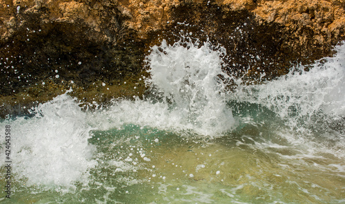 sea ​​waves crash against rocks during a storm in Sharm El Sheikh, Egypt