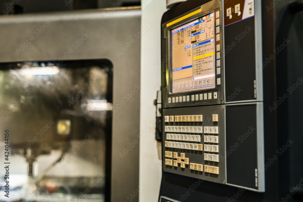 Management of a CNC metalworking machine in a factory. Management of a CNC metalworking machine in a factory.