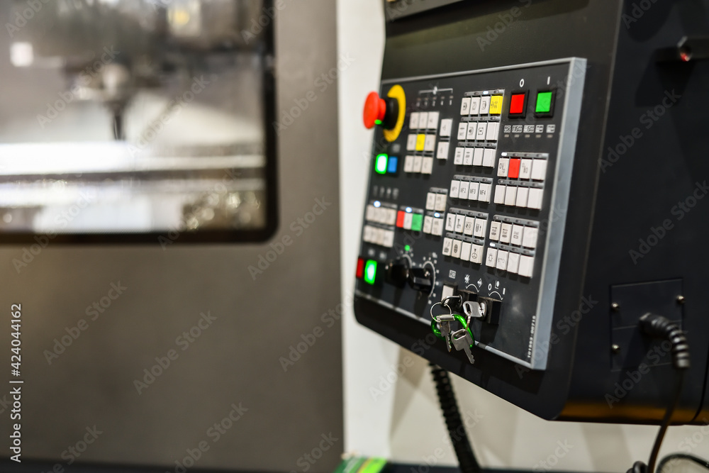 Management of a CNC metalworking machine in a factory.